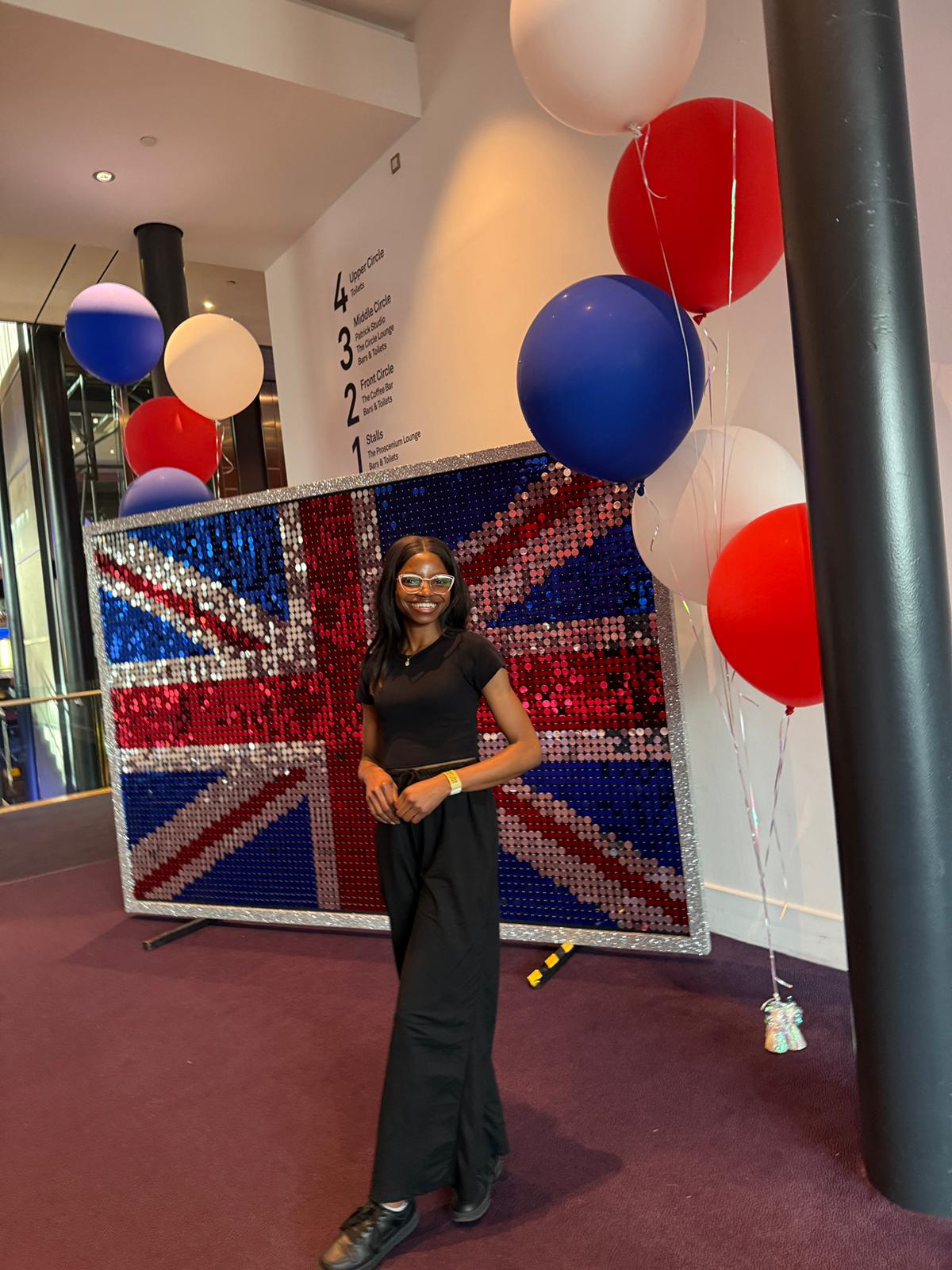 Anave Alonge at Britain's Got Talent with Union Jack backdrop